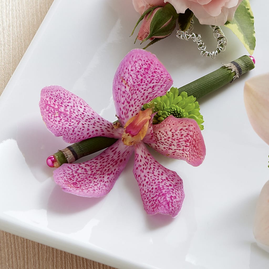 Pink Mokara Boutonniere – SWEET CREATIONS BROOKFIELD FLWRS & BLLNS, Brookfield IL